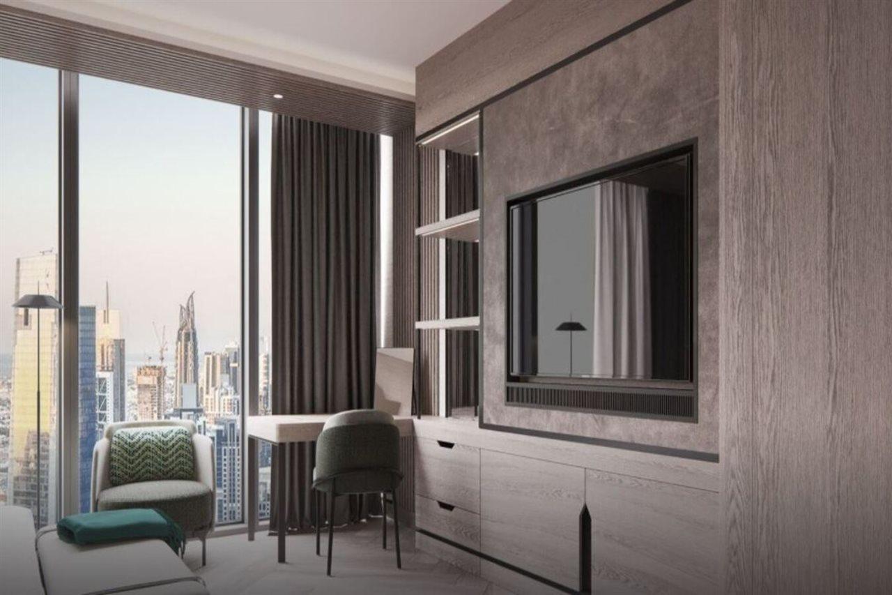 โรงแรมพาราเมาท์ มิดทาวน์ ดูไบ ภายนอก รูปภาพ A typical bedroom
