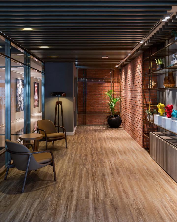 โรงแรมพาราเมาท์ มิดทาวน์ ดูไบ ภายนอก รูปภาพ The interior of the lounge