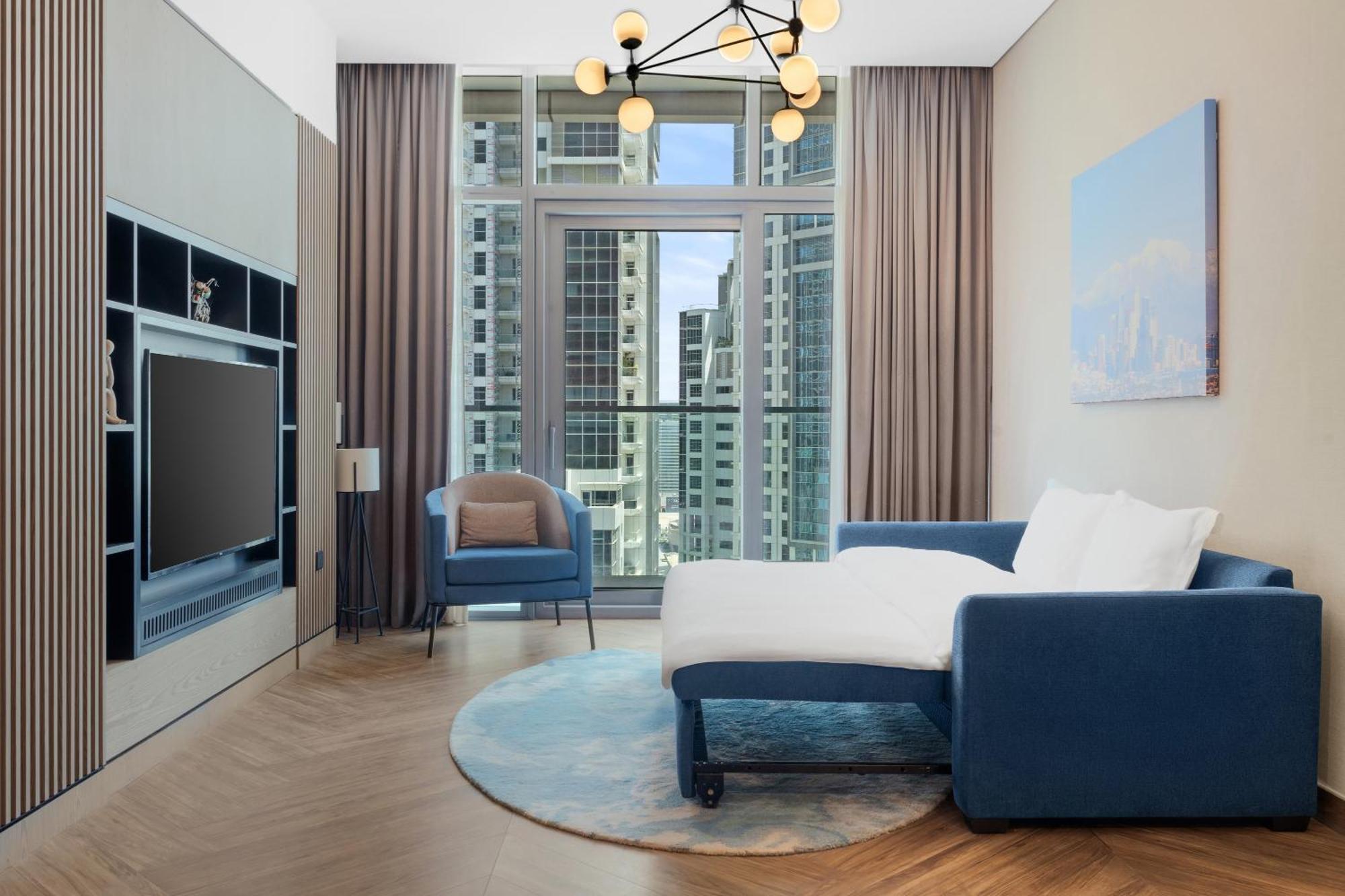 โรงแรมพาราเมาท์ มิดทาวน์ ดูไบ ภายนอก รูปภาพ A sofa bed